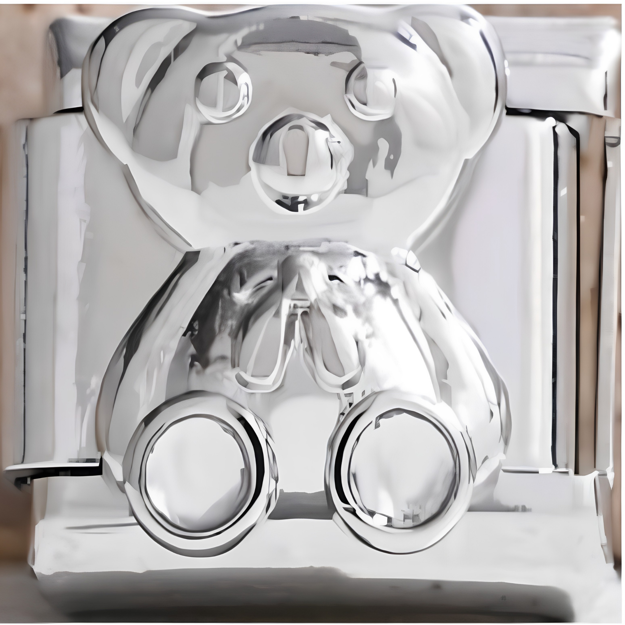Teddy Bear with a Bow Charm